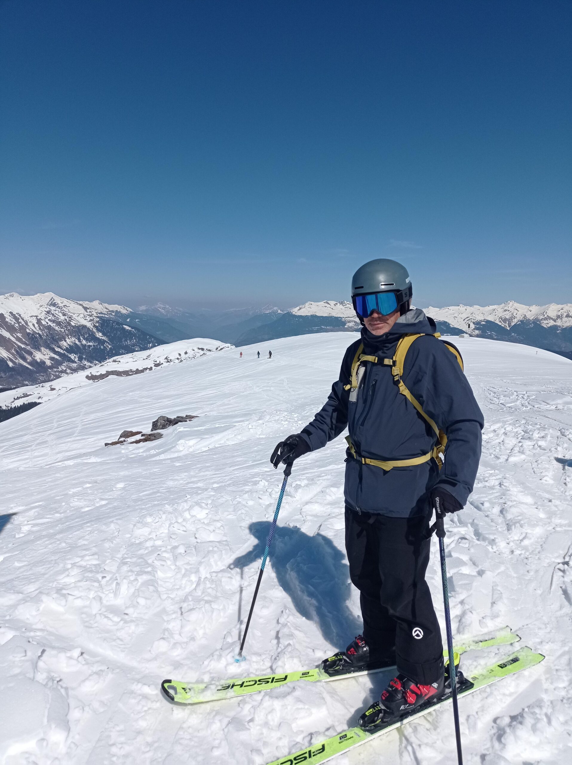 Goodshitskier at the start of the traverse (see riders in background) at the top of the Olympic chairlift.